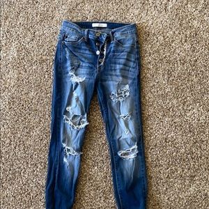 ripped high rise jeans